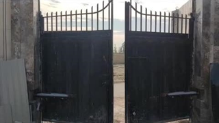 درب پارکینگ اتوماتیک لولایی در اصفهان_درب اتوماتیک حیاط اصفهان